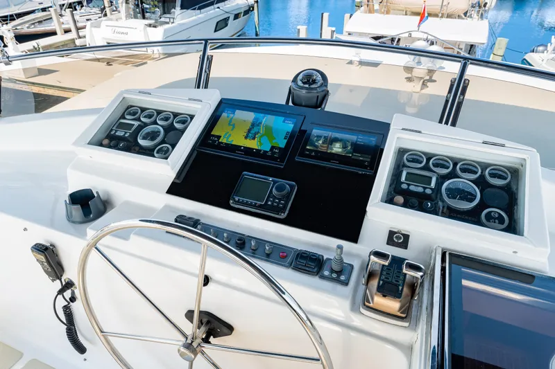 Slide: The Image of Helm of 2008 DeFever 52 Euro yacht with navigation instruments and steering wheel. - 45