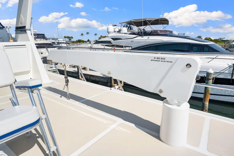 Slide: The Image of 2008 DeFever 52 Euro yacht deck with Brower Systems WC 800 crane, docked at marina. - 51