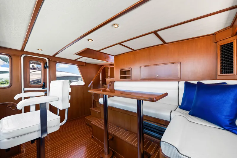 Slide: The Image of Luxurious interior of 2008 DeFever 52 Euro yacht with elegant wood finish and seating. - 56