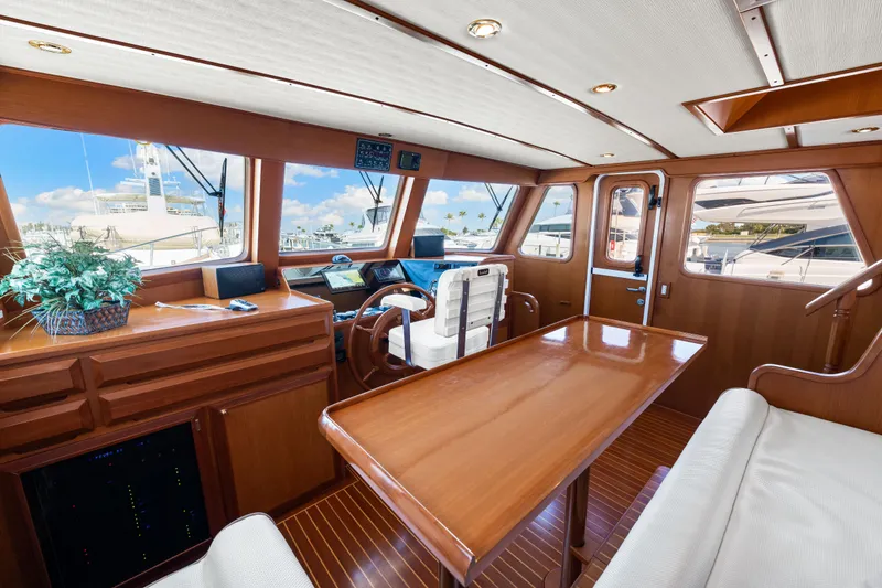 Slide: The Image of Luxurious interior of 2008 DeFever 52 Euro yacht with wooden furnishings and helm station. - 57