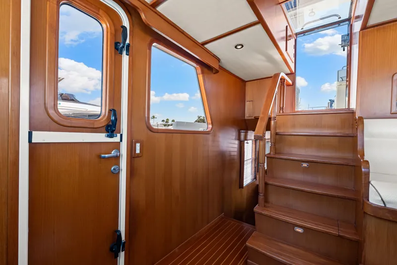 Slide: The Image of Interior of 2008 DeFever 52 Euro yacht with wooden stairs and door. - 58