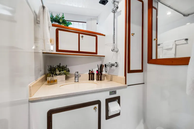 Slide: The Image of Luxurious 2008 DeFever 52 Euro yacht bathroom with elegant wood accents and modern fixtures. - 75