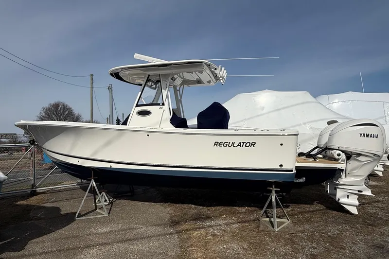The Image of 2024 Regulator 28 Forward Seating boat with Yamaha engine, displayed outdoors. - 0