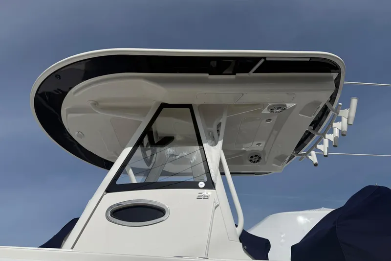 Slide: The Image of 2024 Regulator 28 Forward Seating boat, showcasing sleek design and modern features. - 12
