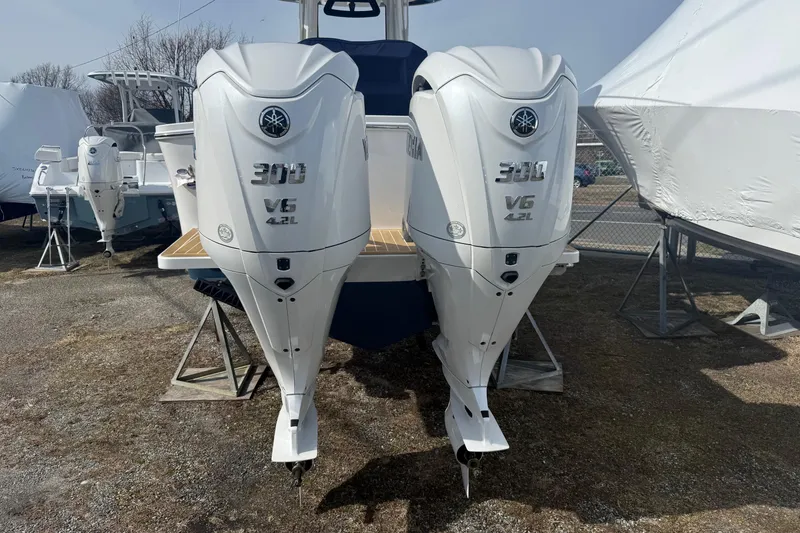 Slide: The Image of 2024 Regulator 28 Forward Seating boat with twin Yamaha 300 V6 4.2L outboard engines. - 7
