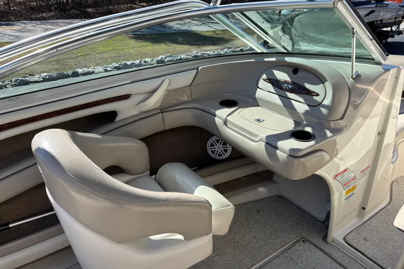 Slide: The Image of Interior of a 2003 Sea Ray 200 Bow Rider boat. - 11