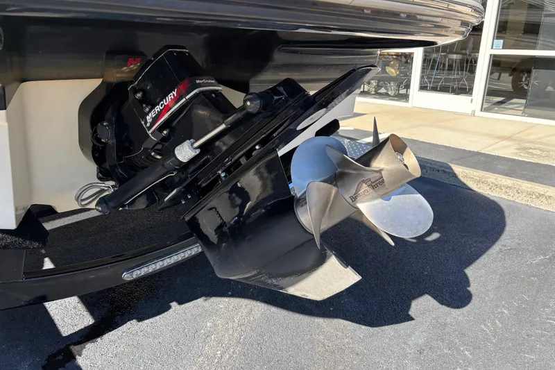 Slide: The Image of 2003 Sea Ray 200 Bow Rider with Mercury Bravo Three outdrive, close-up view. - 4