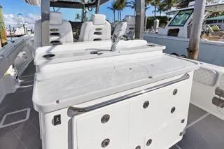 Slide: The Image of 2023 HCB 39 Speciale boat interior with sleek white seating and modern design. - 25