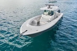 Slide: The Image of 2023 HCB 39 Speciale boat on clear blue water. - 5