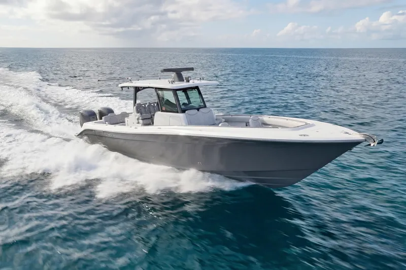 Slide: The Image of 2023 HCB 39 Speciale boat cruising on open ocean waters. - 9