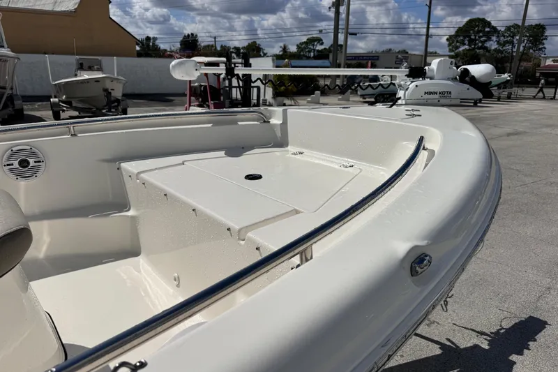 Slide: The Image of 2021 Key West 189 FS boat deck with storage compartment and railing. - 7