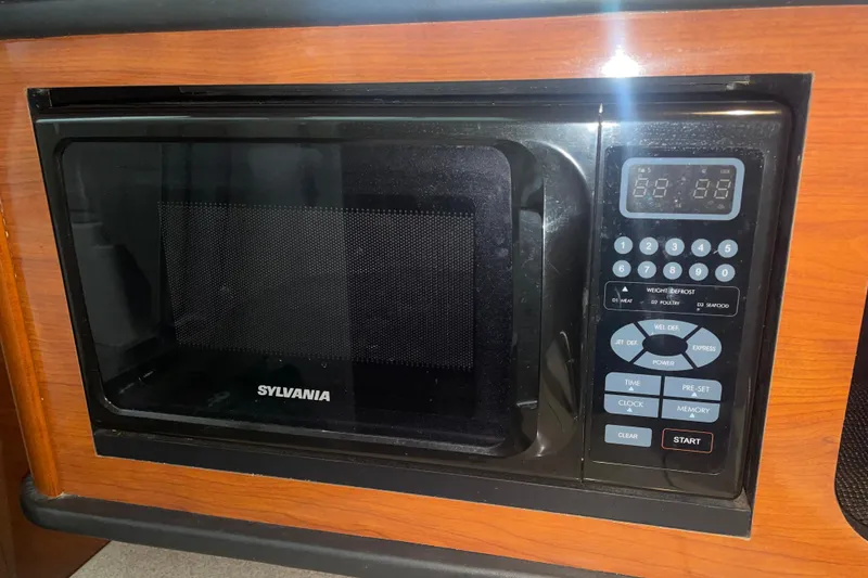 Slide: The Image of Sylvania microwave in 2006 Sea Ray Sundancer 260 boat kitchen. - 21