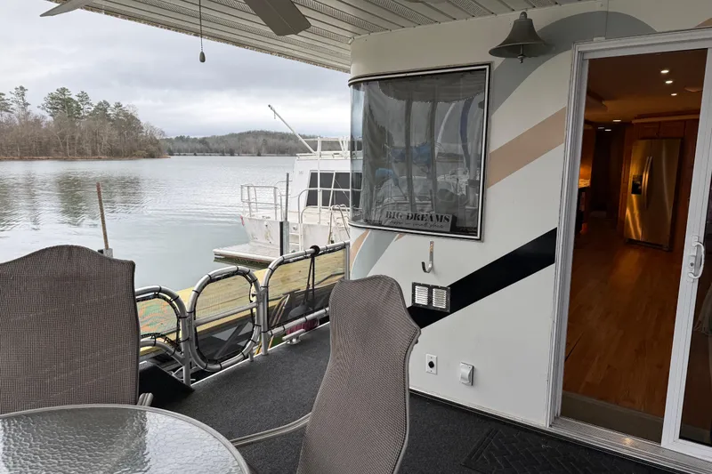 Slide: The Image of Houseboat interior and deck view on a lake, Sharpe 80 X 18, 2001 model. - 102