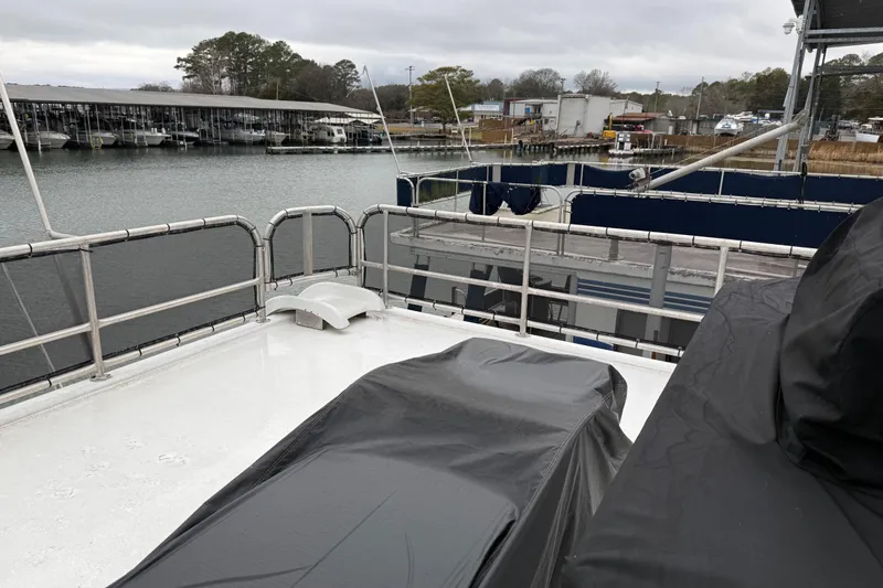 Slide: The Image of Houseboat deck view, Sharpe 80 X 18, 2001 model, docked at marina. - 113