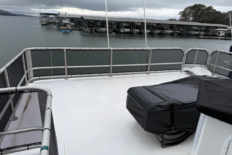 Slide: The Image of Upper deck of 2001 Sharpe 80 X 18 houseboat overlooking marina. - 114