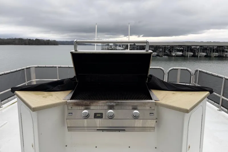 Slide: The Image of Outdoor grill on a 2001 Sharpe 80 X 18 houseboat deck, overlooking a marina. - 116