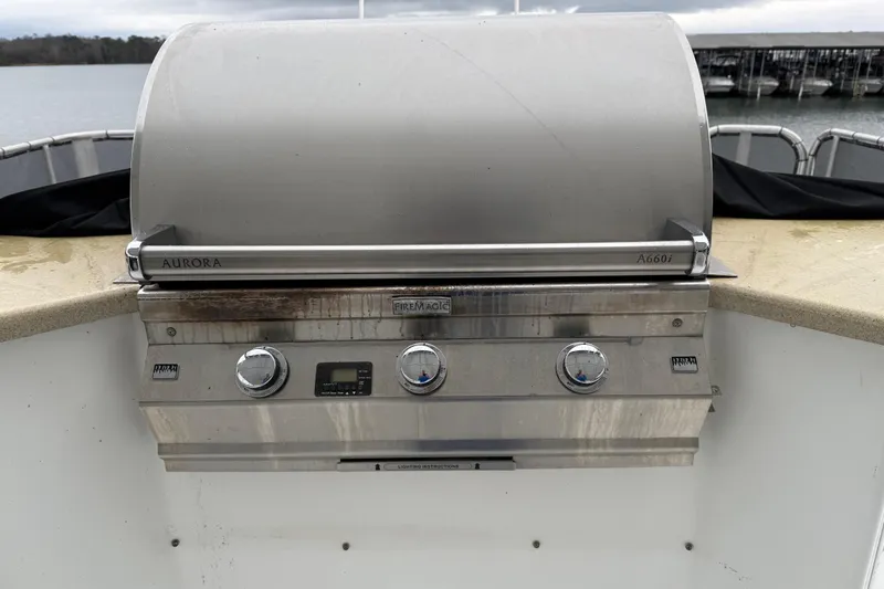 Slide: The Image of Outdoor stainless steel grill on a 2001 Sharpe 80 X 18 houseboat deck. - 117