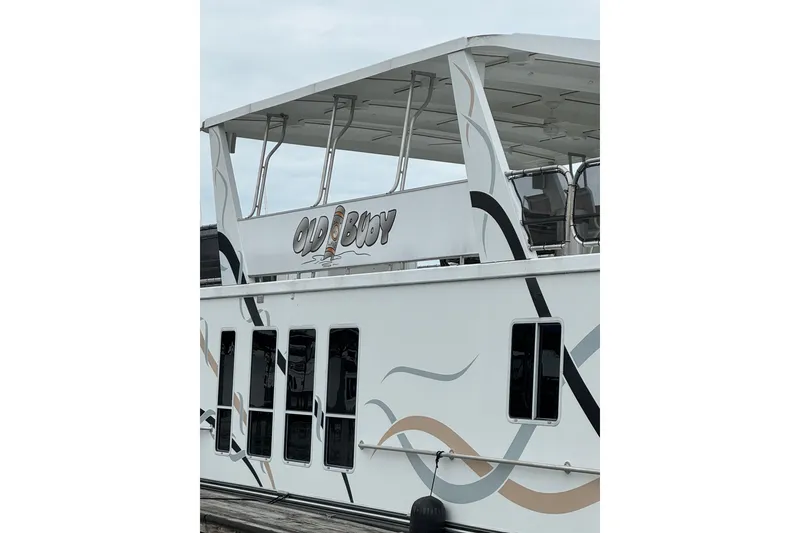 Slide: The Image of Houseboat "Old Buoy" by Sharpe, model 80 X 18, year 2001, docked. - 138