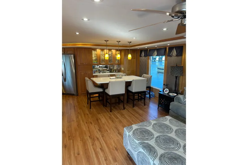 Slide: The Image of Luxurious houseboat interior with modern kitchen and dining area, Sharpe 80 X 18, 2001 model. - 145