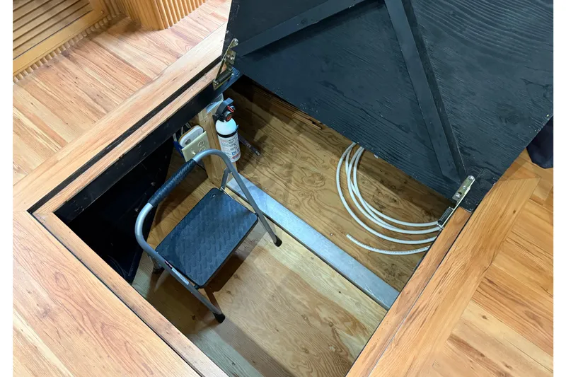 Slide: The Image of Open hatch with ladder and cables on wooden floor, Sharpe 80 X 18, 2001 model. - 18