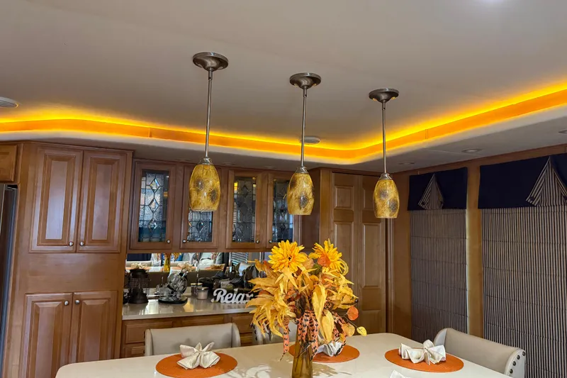 Slide: The Image of Luxurious kitchen interior on 2001 Sharpe 80 X 18 houseboat with warm lighting and elegant decor. - 20