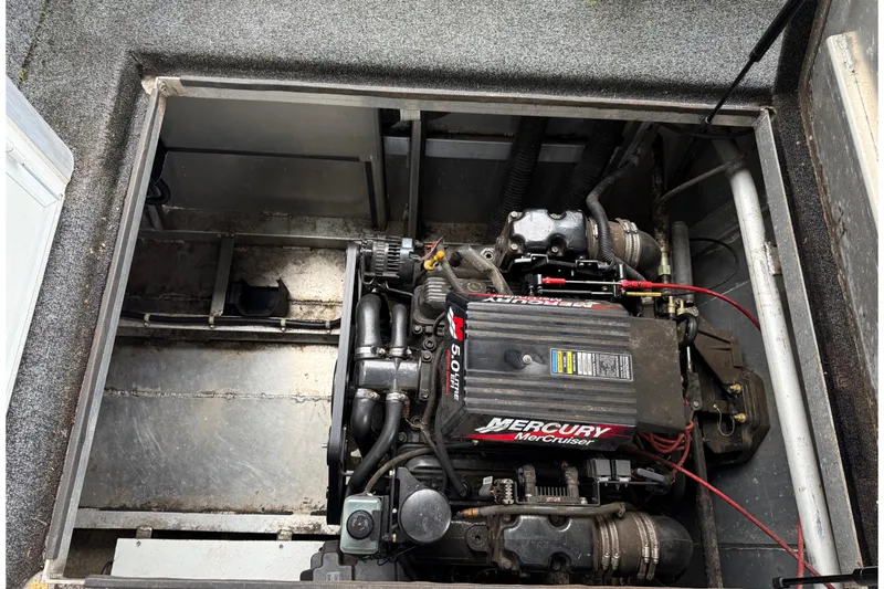 Slide: The Image of Engine compartment of a 2001 Sharpe 80 X 18 houseboat with Mercury MerCruiser engine. - 29