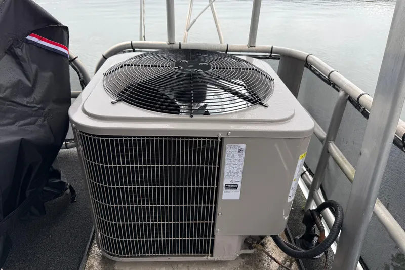Slide: The Image of Outdoor air conditioning unit on a boat deck, Sharpe 80 X 18, 2001 model. - 35