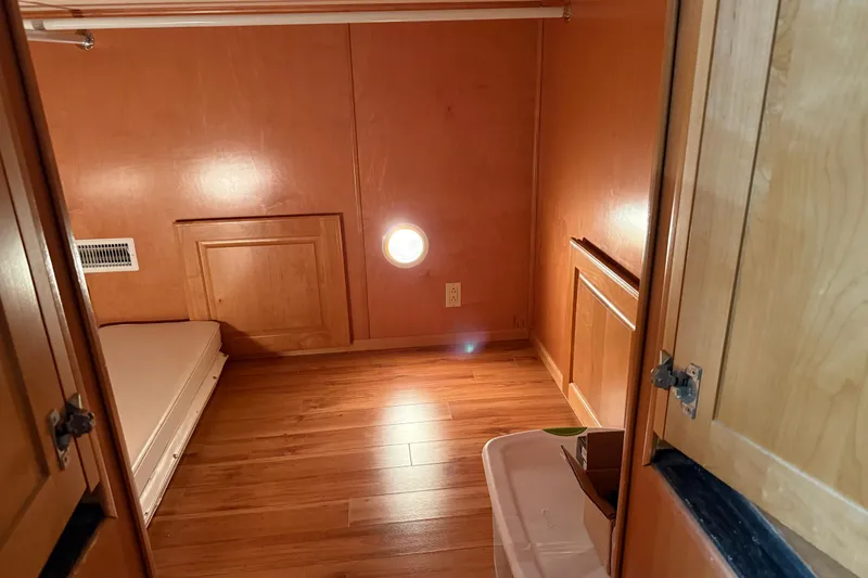 Slide: The Image of Small wooden room interior in a 2001 Sharpe 80 X 18 houseboat. - 41