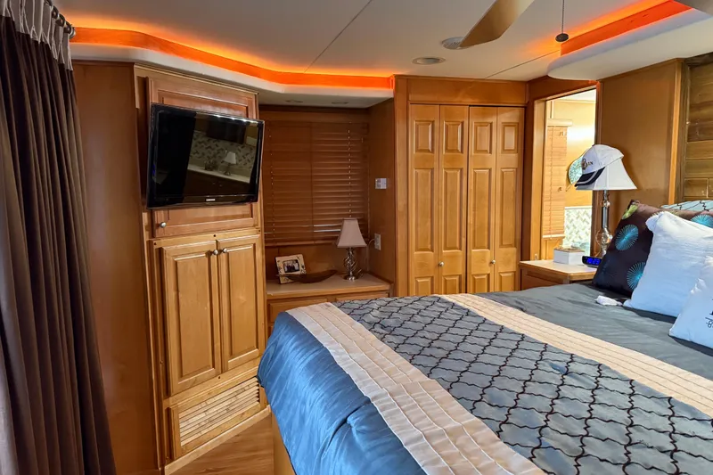 Slide: The Image of Luxurious bedroom in 2001 Sharpe 80 X 18 houseboat with modern decor and ambient lighting. - 52