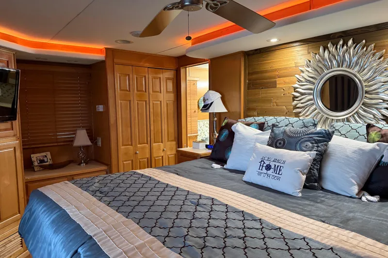 Slide: The Image of Luxurious bedroom in 2001 Sharpe 80 X 18 houseboat with elegant decor and ambient lighting. - 53