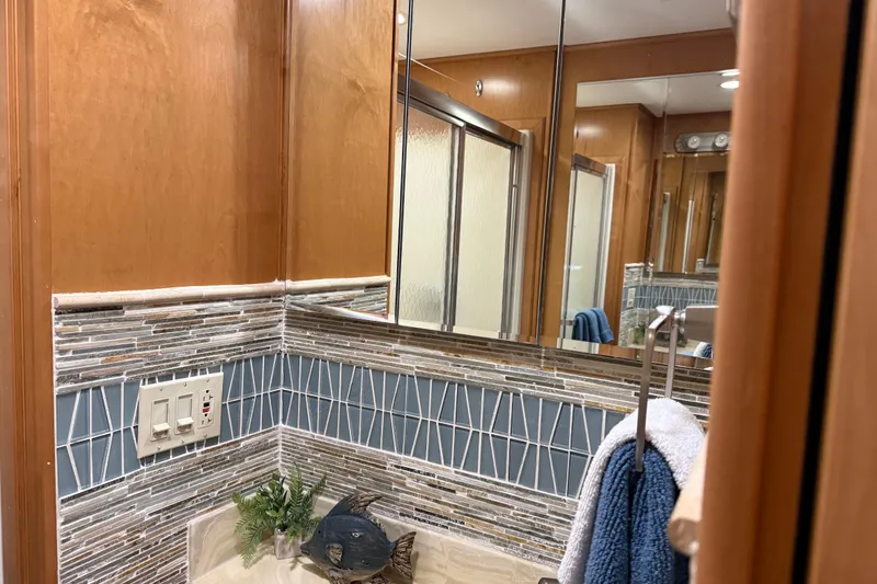 Slide: The Image of Bathroom interior with modern tile design in a 2001 Sharpe 80 X 18 model. - 57