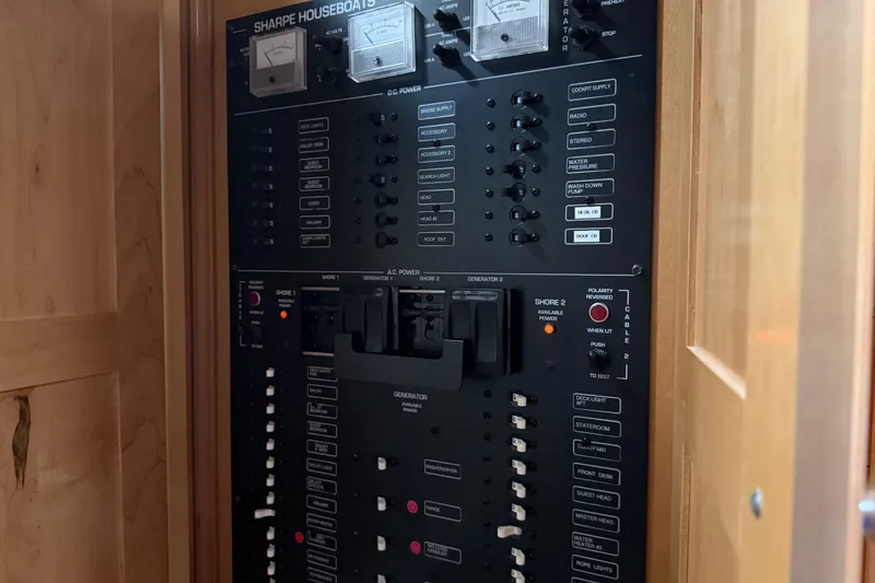 Slide: The Image of Electrical control panel of a 2001 Sharpe 80 X 18 houseboat. - 62