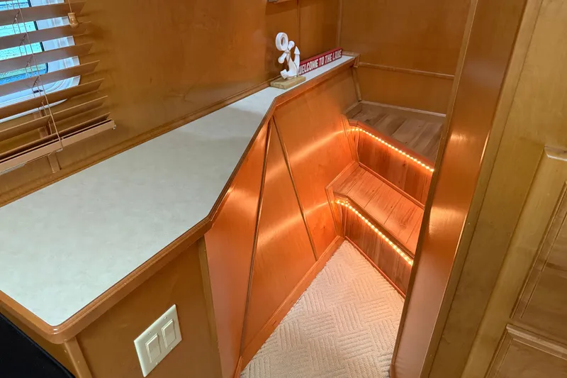 Slide: The Image of Wooden interior stairs with LED lighting in a 2001 Sharpe 80 X 18 houseboat. - 73