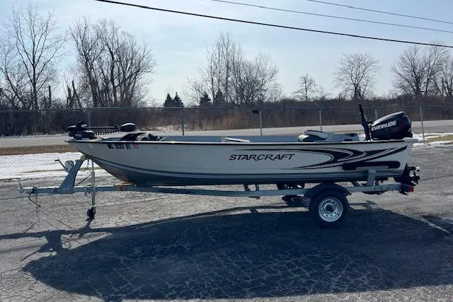 The Image of 2019 Starcraft Patriot 16 TL boat on trailer, parked outdoors. - 0