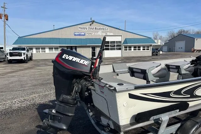 Slide: The Image of 2019 Starcraft Patriot 16 TL boat with Evinrude motor at Happy Days Boating Co. dealership. - 10