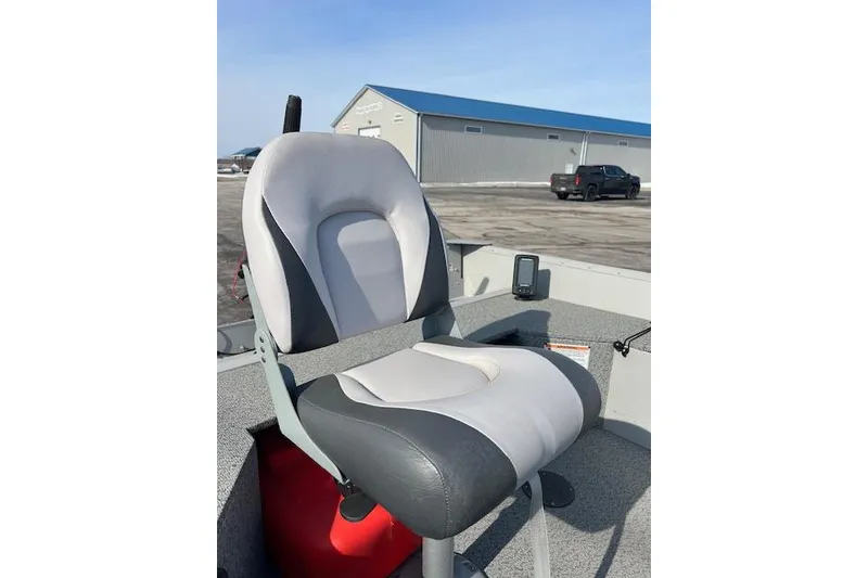 Slide: The Image of 2019 Starcraft Patriot 16 TL boat seat with gray and white upholstery. - 7