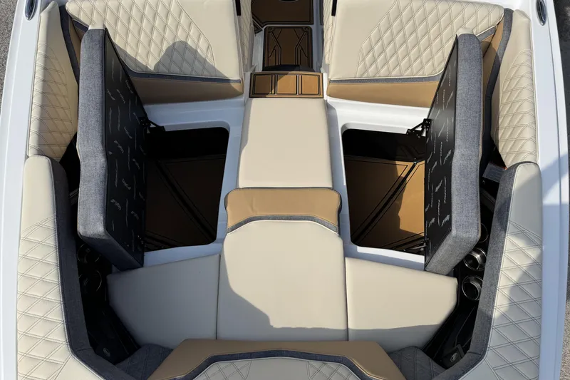 Slide: The Image of 2026 Tigé 24RZX boat interior with luxurious seating and storage compartments. - 15
