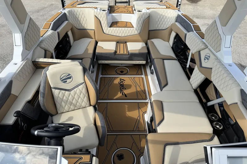 Slide: The Image of 2026 Tigé 24RZX boat interior with luxurious seating and modern design. - 16