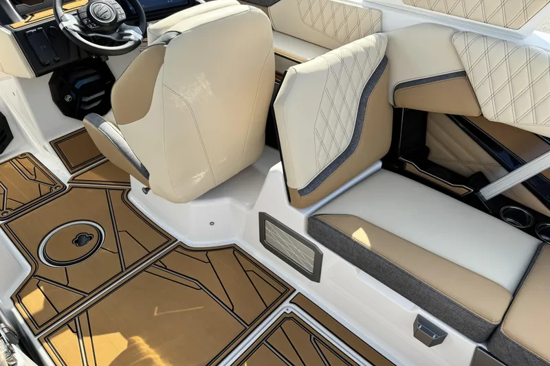 Slide: The Image of 2026 Tigé 24RZX boat interior with beige seating and stylish flooring. - 20