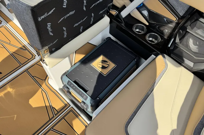 Slide: The Image of 2026 Tigé 24RZX boat interior with custom seating and integrated cooler. - 22