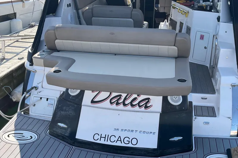 Slide: The Image of 2014 Regal 35 Sport Coupe boat named "Dalia" docked in Chicago at night. - 16