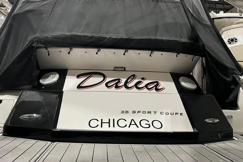 Slide: The Image of 2014 Regal 35 Sport Coupe yacht named "Dalia" docked in Chicago marina. - 18