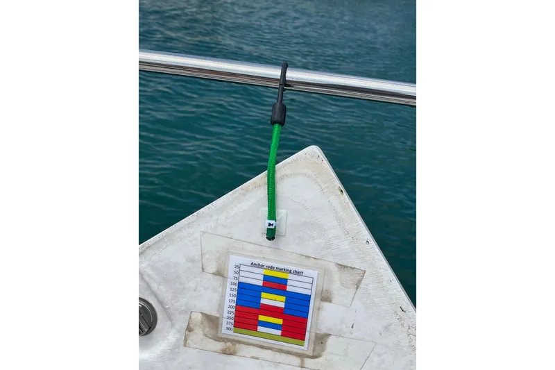 Slide: The Image of Bow view of 2014 Regal 35 Sport Coupe with speakers and life ring. - 23