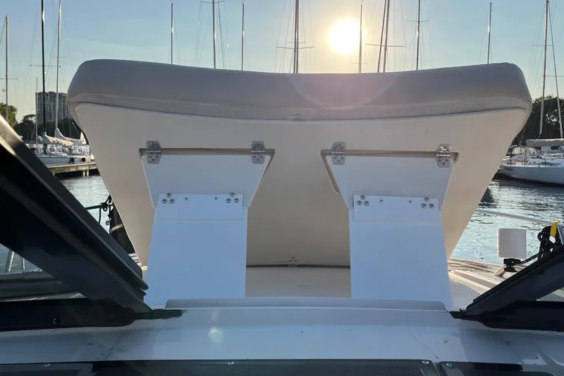 Slide: The Image of 2014 Regal 35 Sport Coupe boat with diamond-stitched upholstery and cup holders. - 26