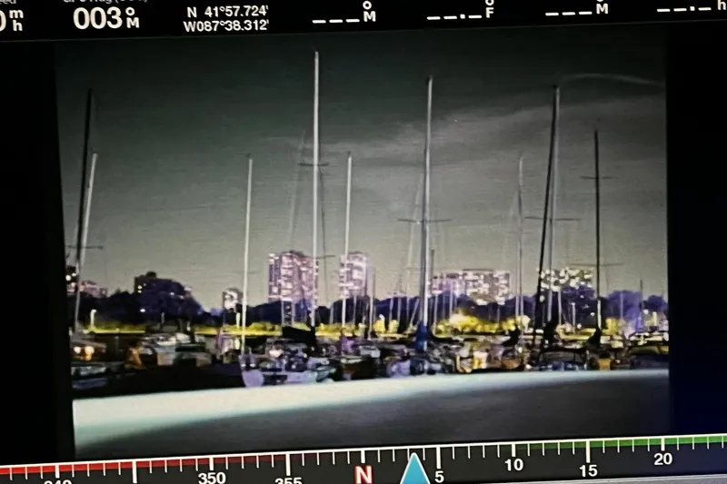 Slide: The Image of Dashboard of a 2014 Regal 35 Sport Coupe with digital displays and controls. - 35