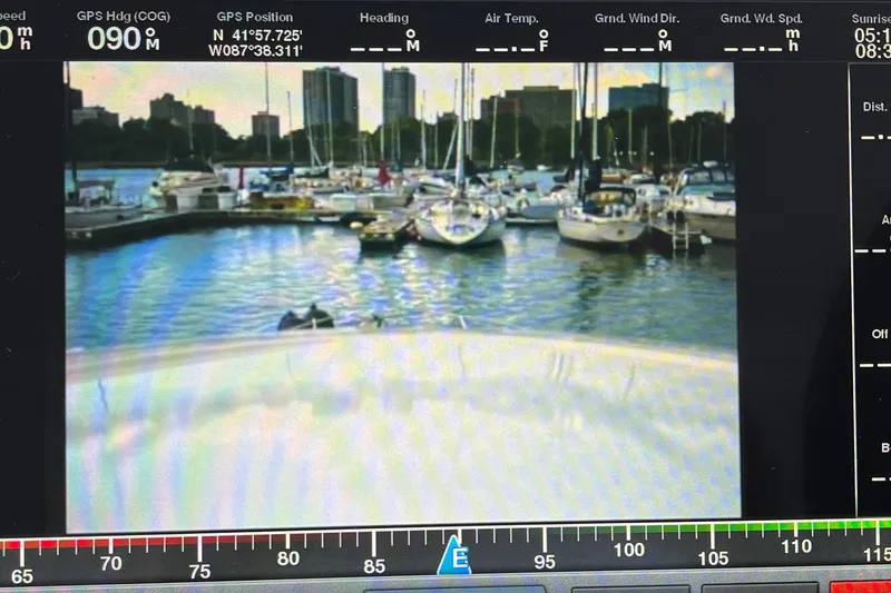Slide: The Image of Garmin display showing dual camera views on a 2014 Regal 35 Sport Coupe boat. - 37