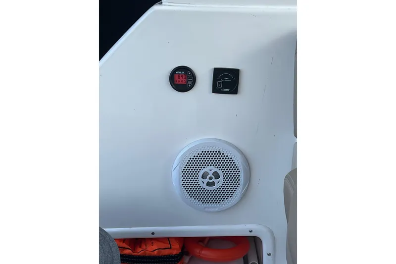 Slide: The Image of Entertainment screen on 2014 Regal 35 Sport Coupe boat interior. - 46