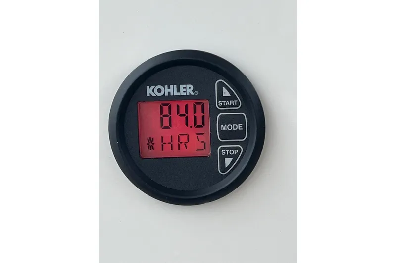 Slide: The Image of LG TV with remote on a 2014 Regal 35 Sport Coupe boat. - 47