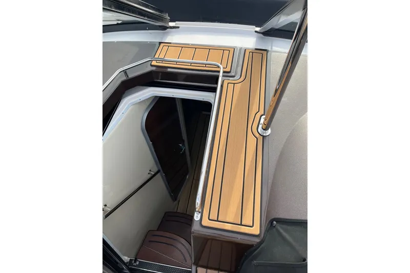 Slide: The Image of Engine compartment of a 2014 Regal 35 Sport Coupe, showcasing dual engines and components. - 49