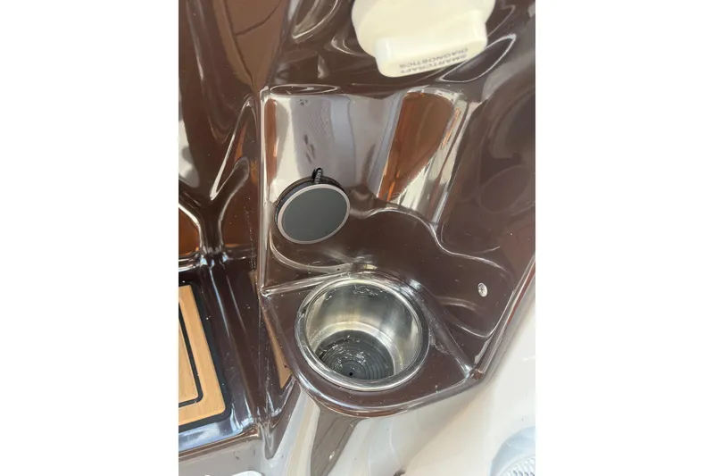 Slide: The Image of 2014 Regal 35 Sport Coupe interior panel with speaker and controls. - 50